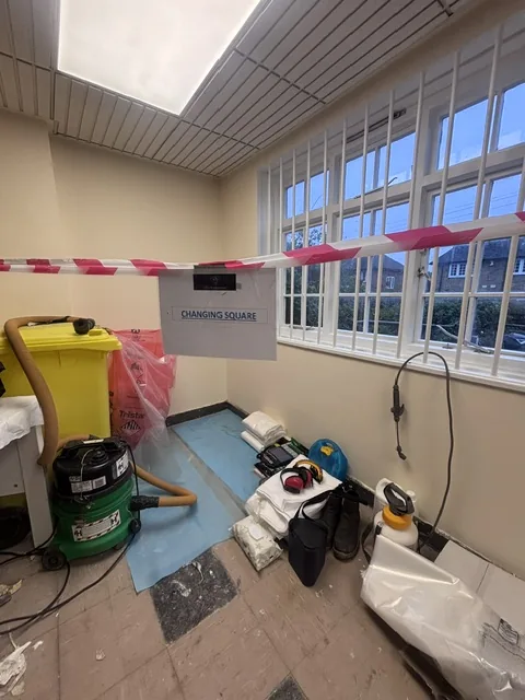 Asbestos floor tile and bitumen removal in South Norwood